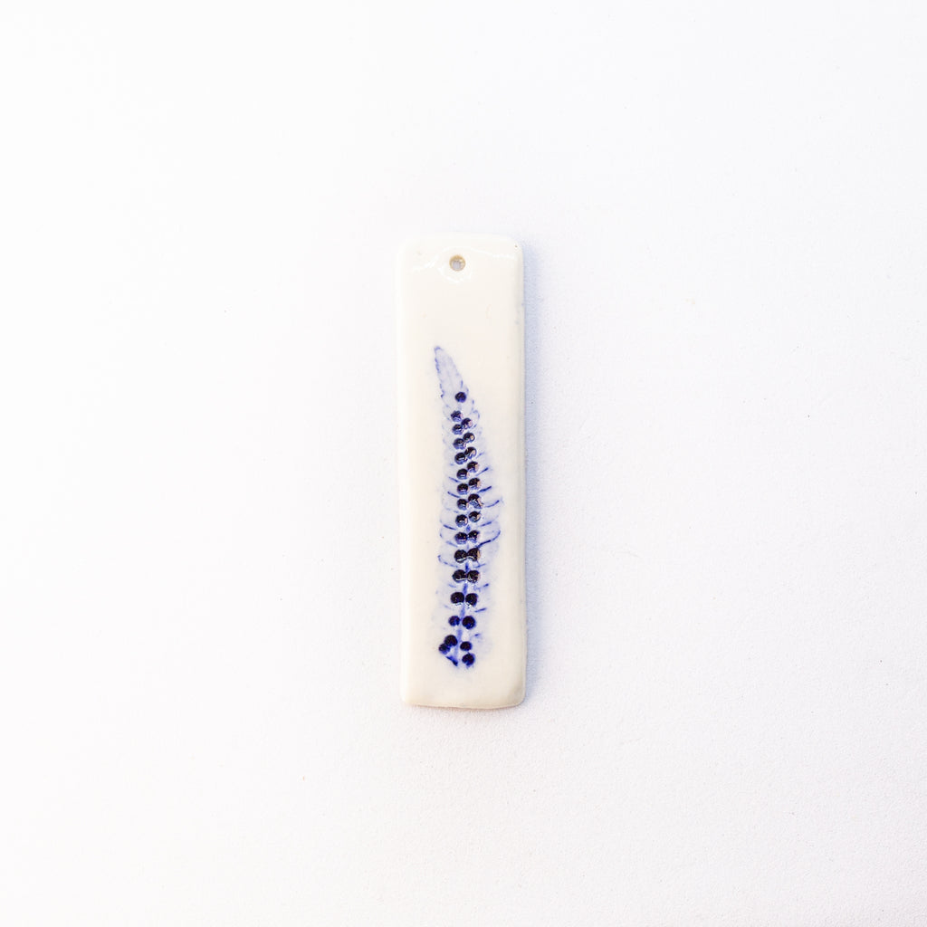 Porcelain charm
