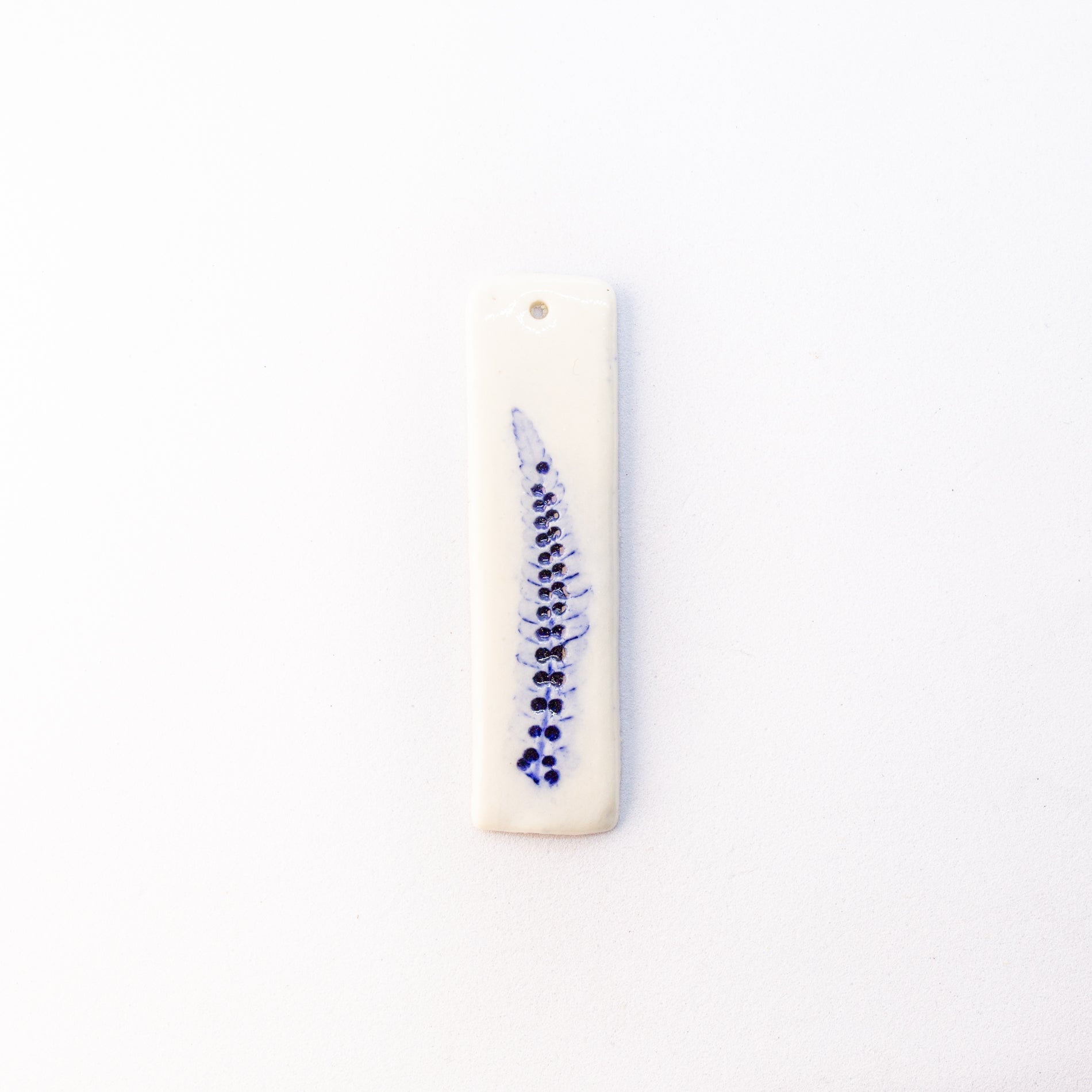 Porcelain charm