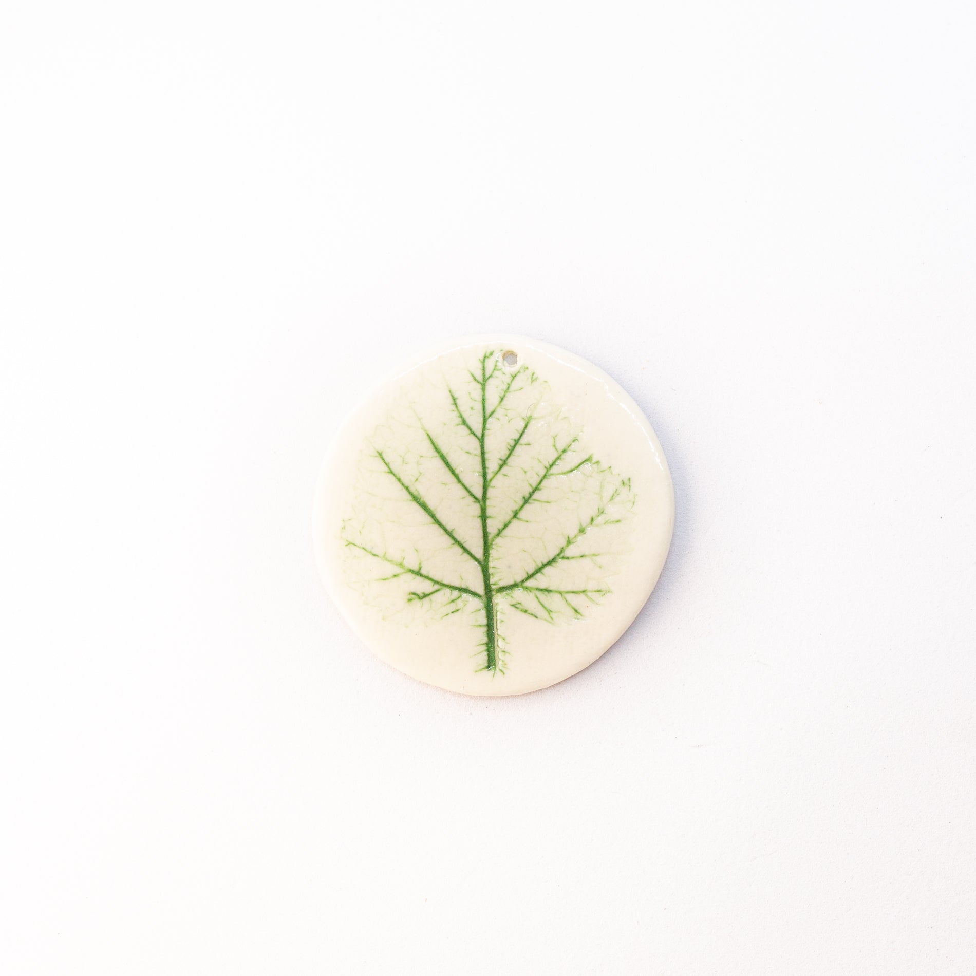 Porcelain charm