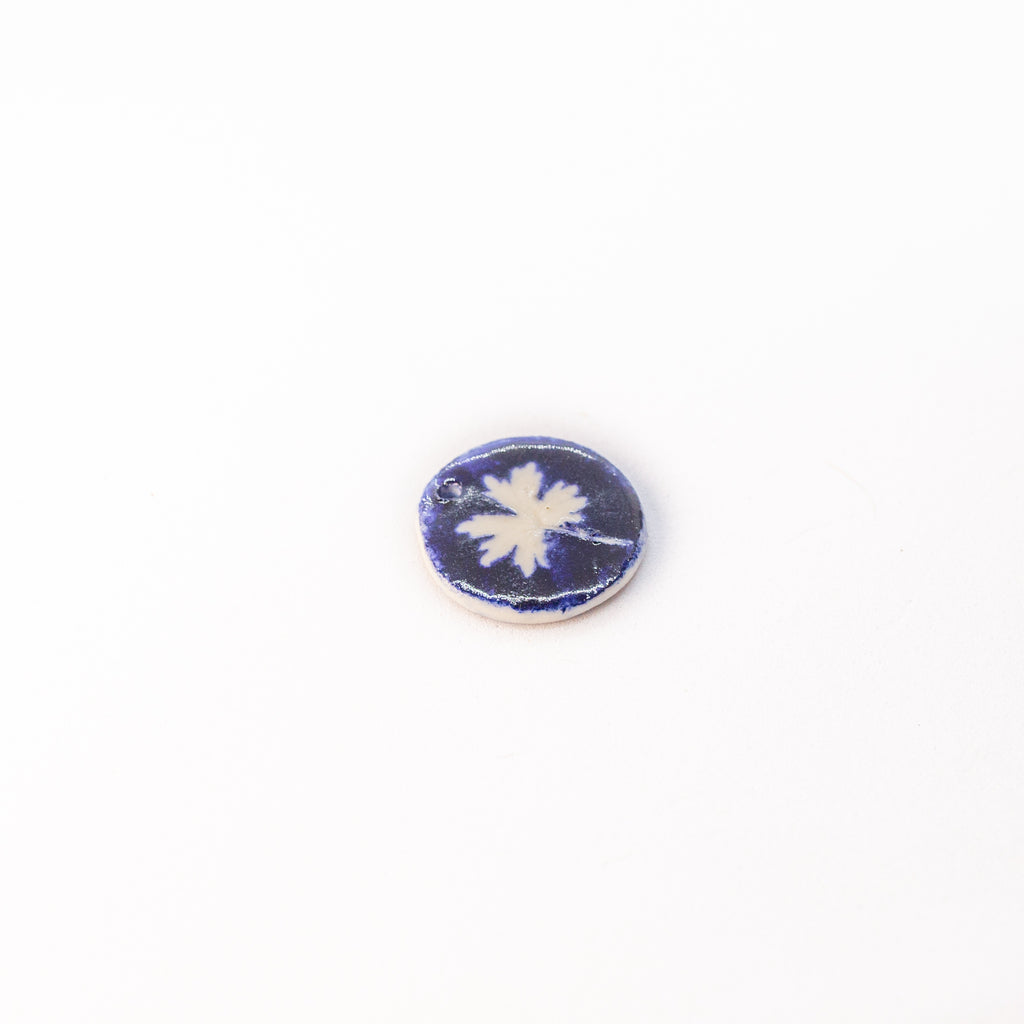 Porcelain charm
