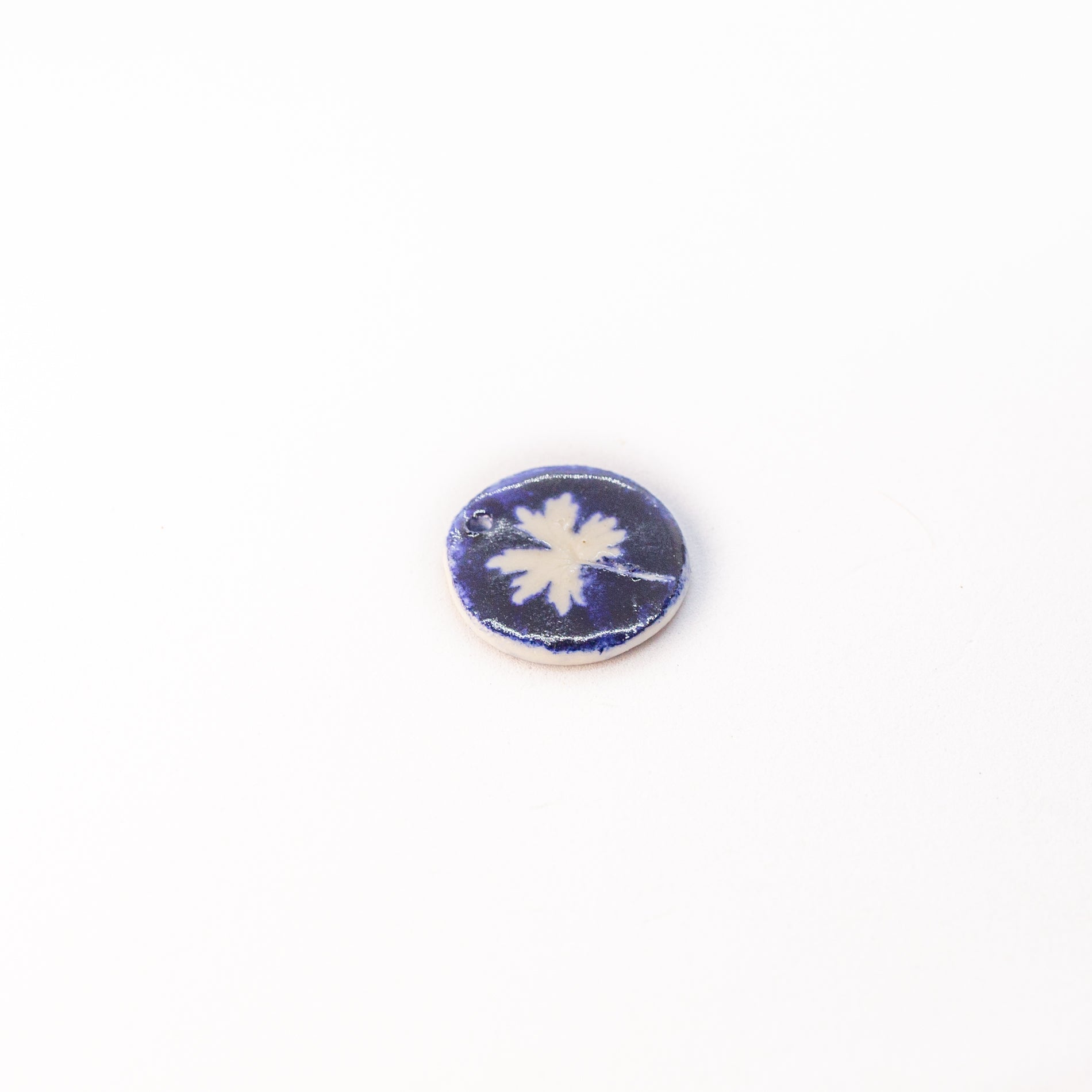 Porcelain charm