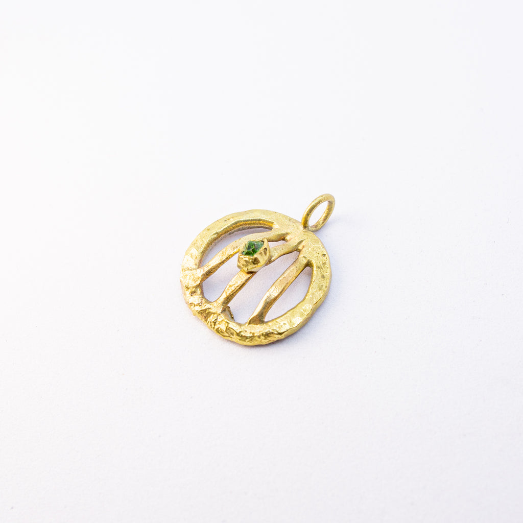 Brass charm