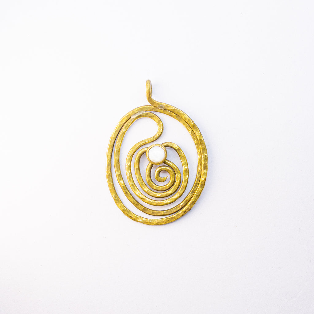 Brass charm