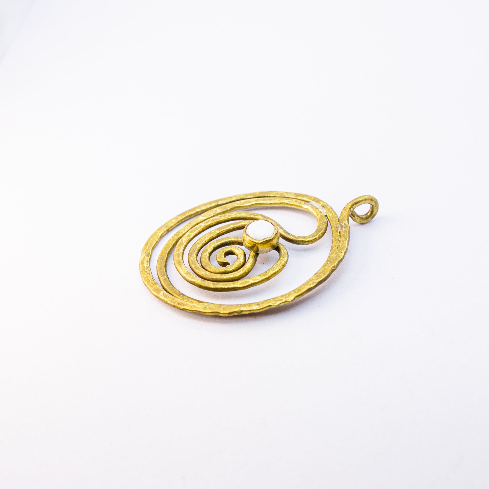 Brass charm