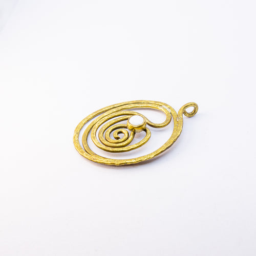 Brass charm