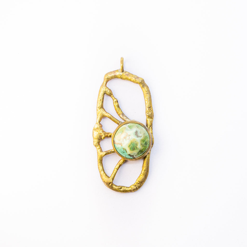 Brass charm