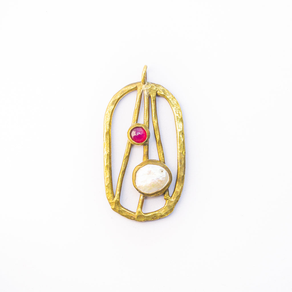 Brass charm