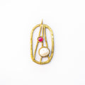 Brass charm