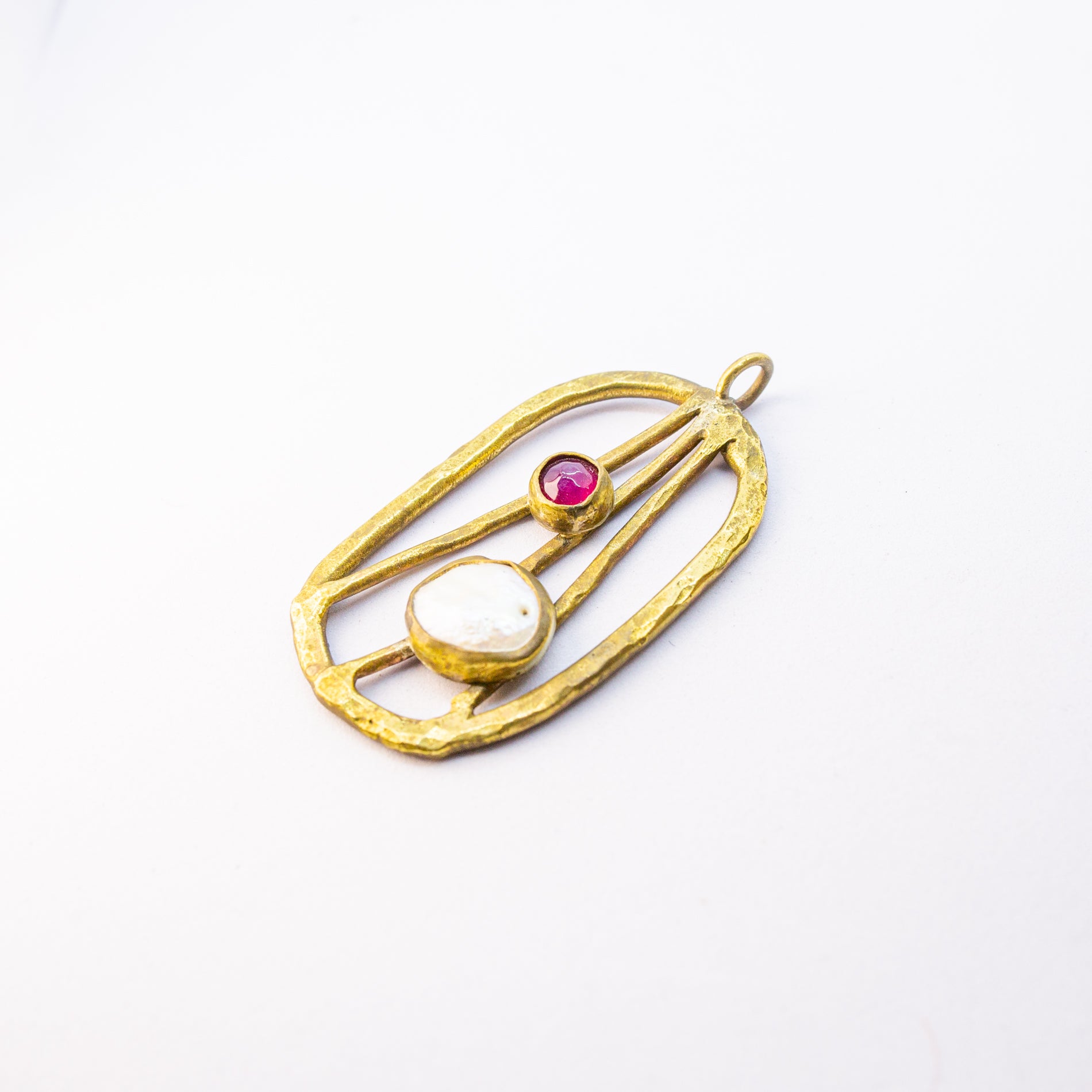 Brass charm