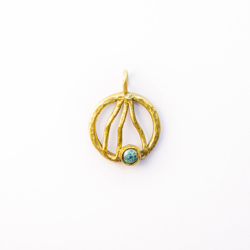 Brass charm