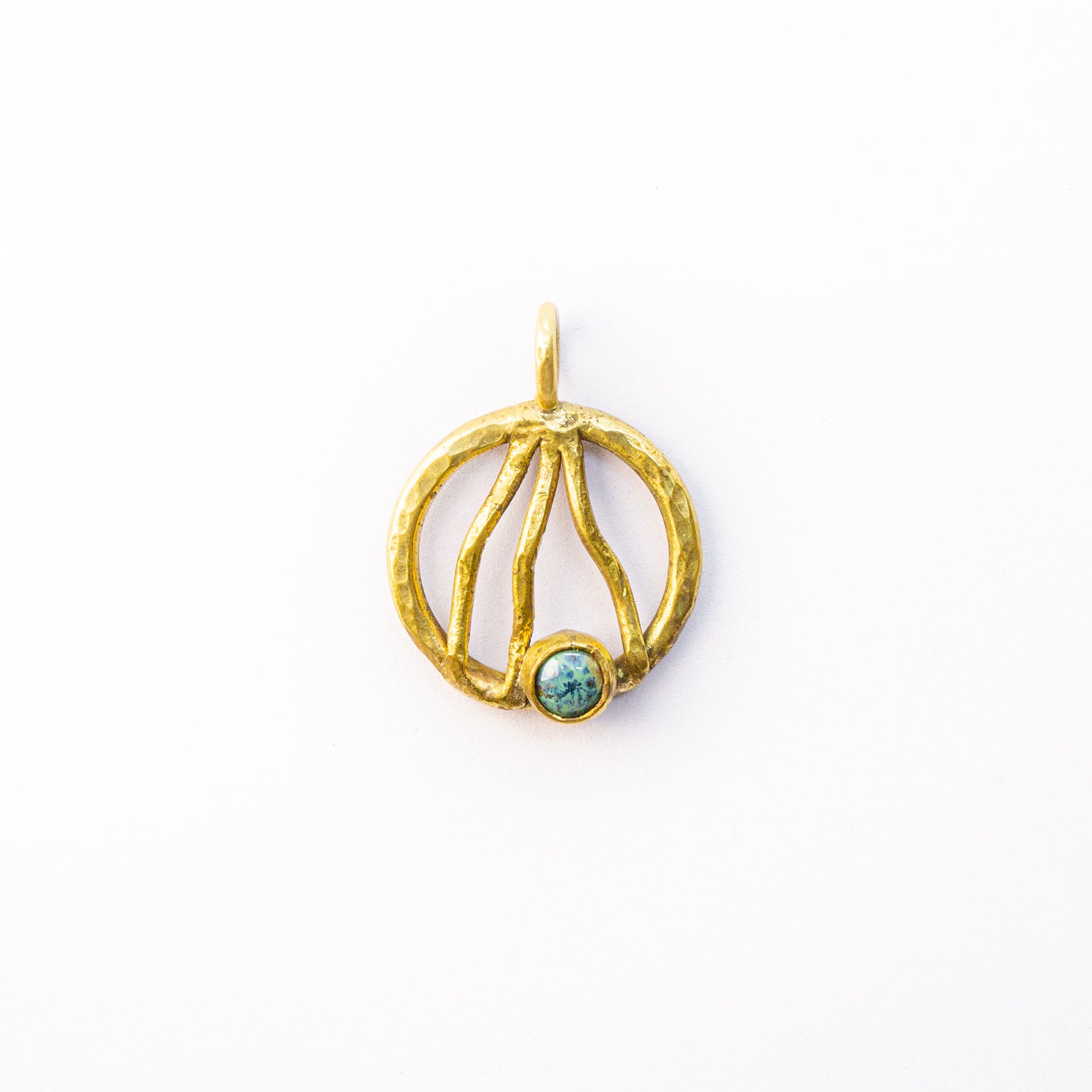 Brass charm