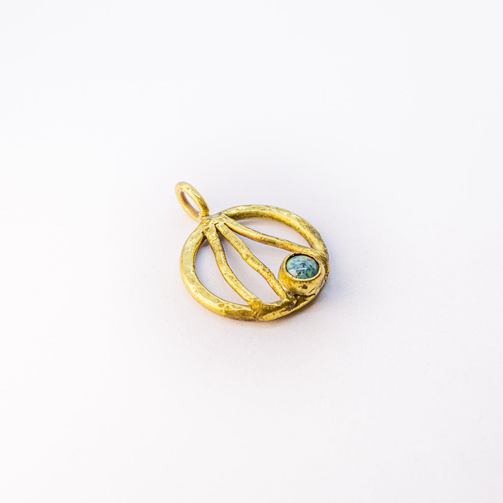 Brass charm