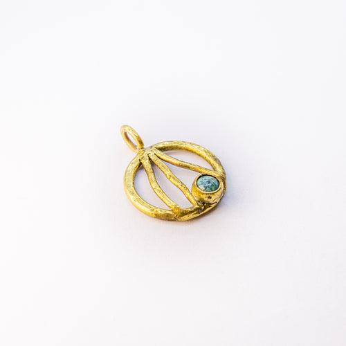 Brass charm