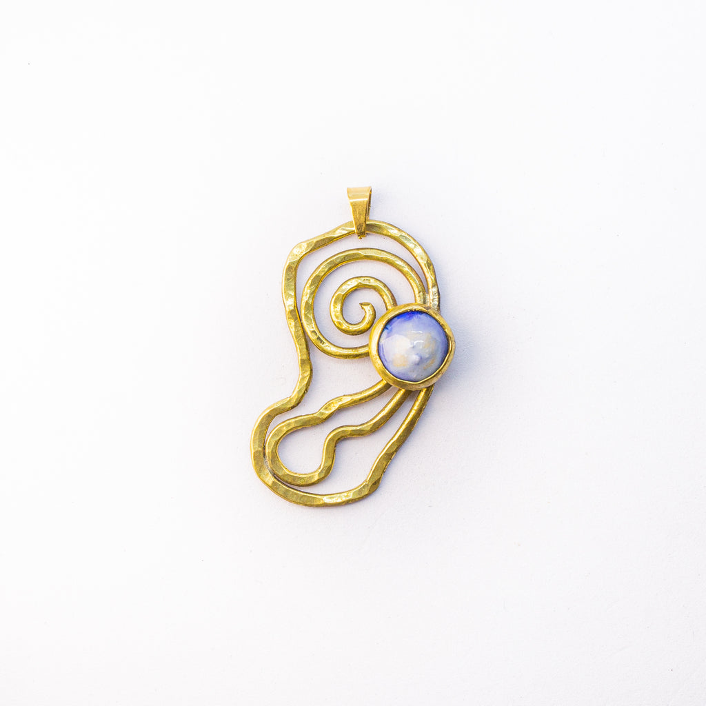 Brass charm